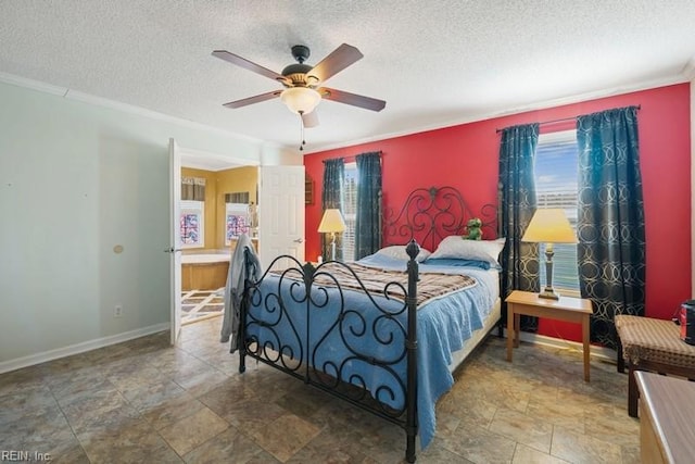 bedroom featuring ceiling fan, ornamental molding, and a textured ceiling