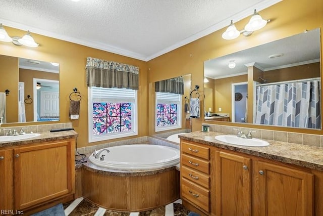 bathroom featuring vanity, a textured ceiling, and ornamental molding