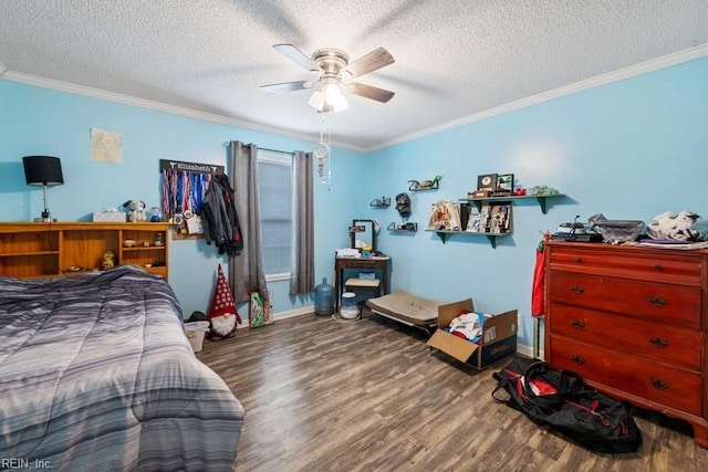 bedroom with a textured ceiling, ceiling fan, wood-type flooring, and ornamental molding