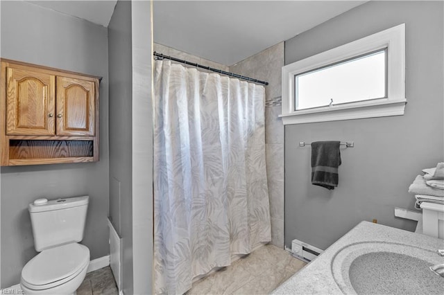 bathroom featuring a shower with curtain, vanity, toilet, and baseboard heating