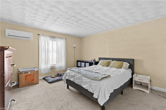 bedroom featuring carpet flooring and a wall unit AC