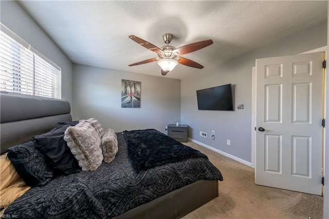 bedroom with light colored carpet and ceiling fan