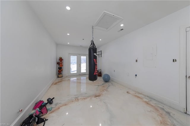 interior space with electric panel and french doors