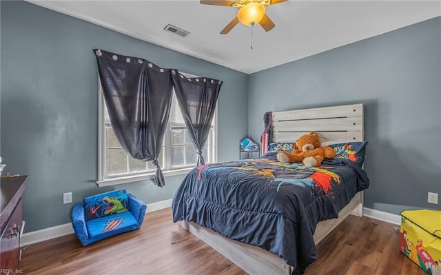 bedroom featuring ceiling fan and hardwood / wood-style floors