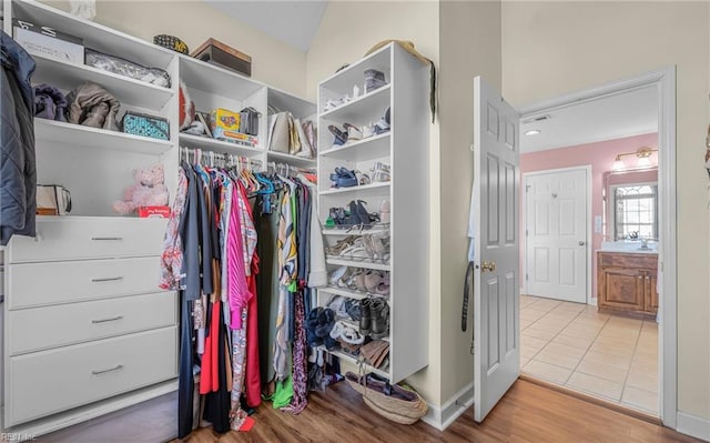 walk in closet featuring wood-type flooring