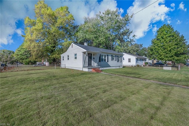 view of front of house with a front yard