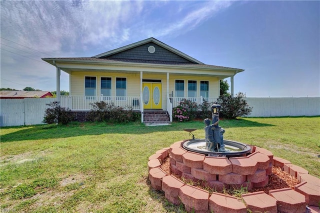 view of front of house featuring a porch and a front lawn