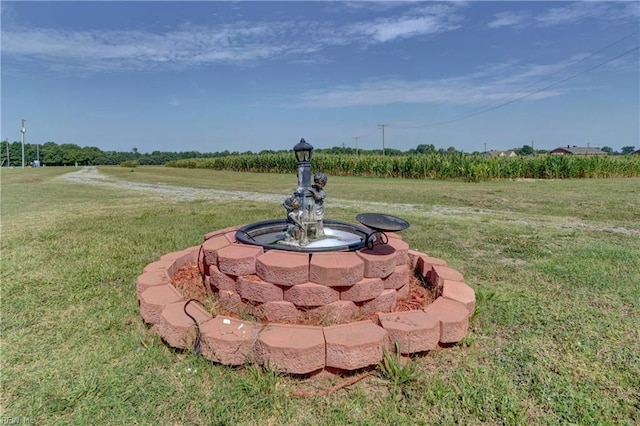 view of storm shelter featuring a yard