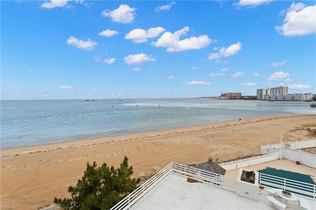 view of water feature with a beach view