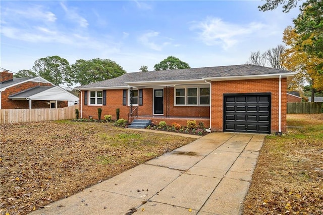 single story home with a garage