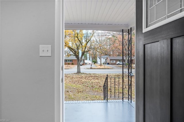 doorway to outside with concrete flooring