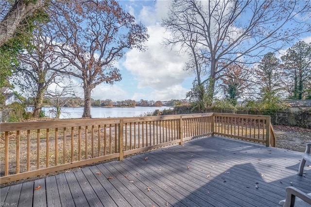 wooden terrace with a water view