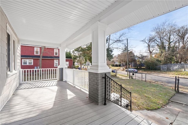 wooden deck featuring a porch