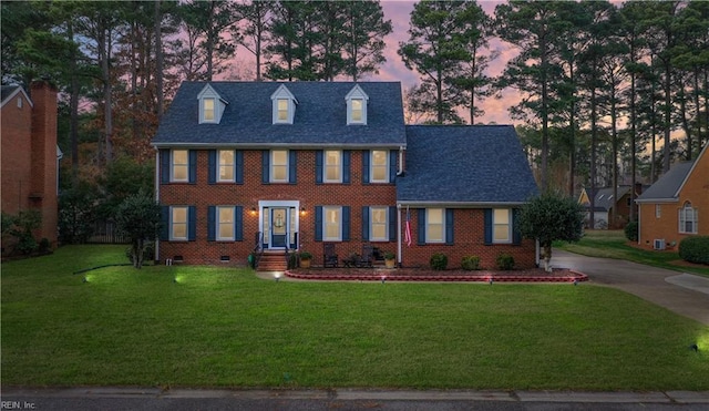 colonial house with a lawn