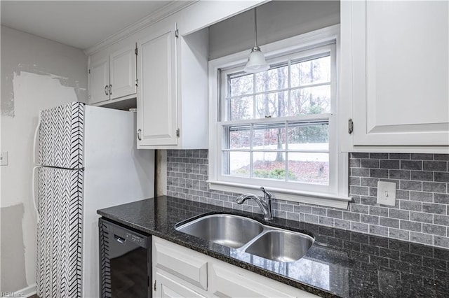 kitchen with pendant lighting, dishwasher, sink, decorative backsplash, and white cabinetry