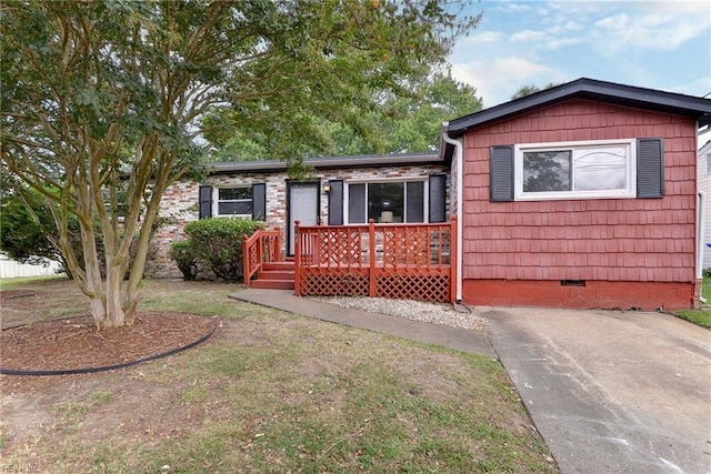 view of front of house with a deck