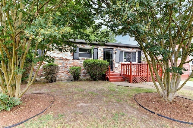 view of front facade with a deck