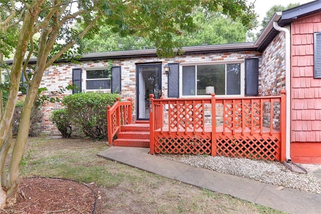 view of front of house with a deck