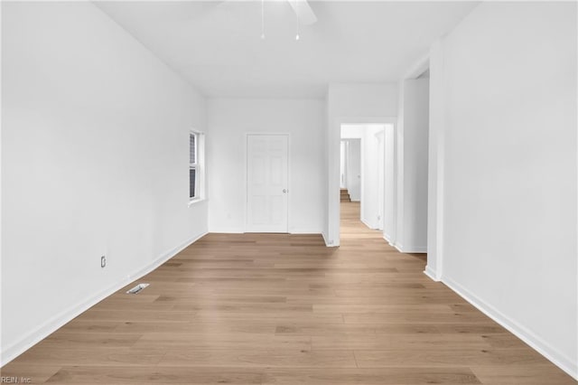 unfurnished room featuring light hardwood / wood-style floors