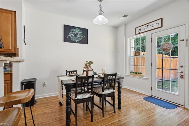 dining room featuring light hardwood / wood-style flooring