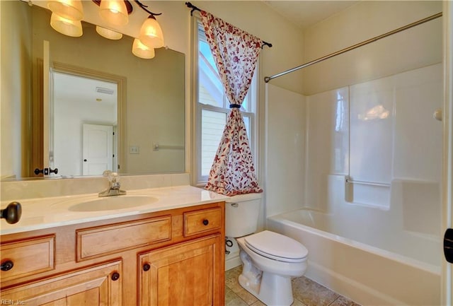 full bathroom featuring washtub / shower combination, vanity, tile patterned floors, and toilet