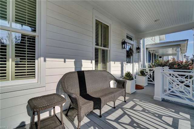 wooden deck featuring a porch