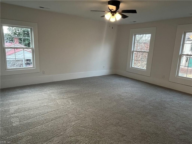 carpeted empty room with ceiling fan