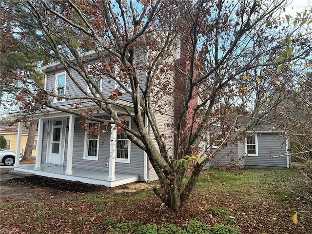 view of home's exterior featuring covered porch