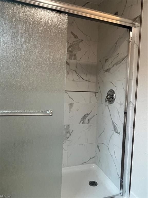 bathroom featuring walk in shower