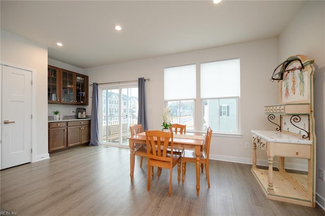 dining area with light wood-type flooring