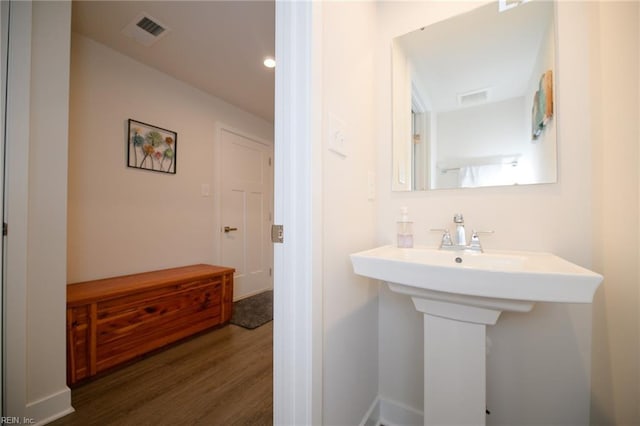 bathroom featuring hardwood / wood-style floors