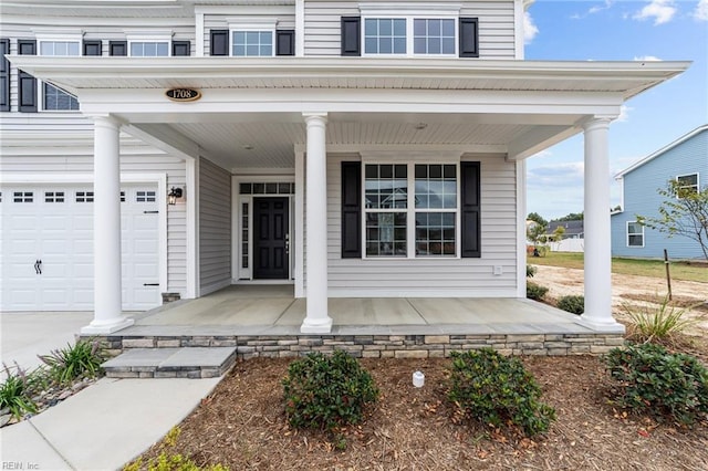 property entrance featuring a porch