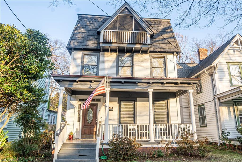 view of front facade with a porch and a balcony