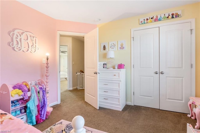 bedroom with carpet flooring and a closet