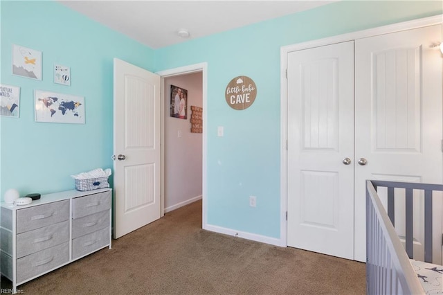 carpeted bedroom featuring a closet