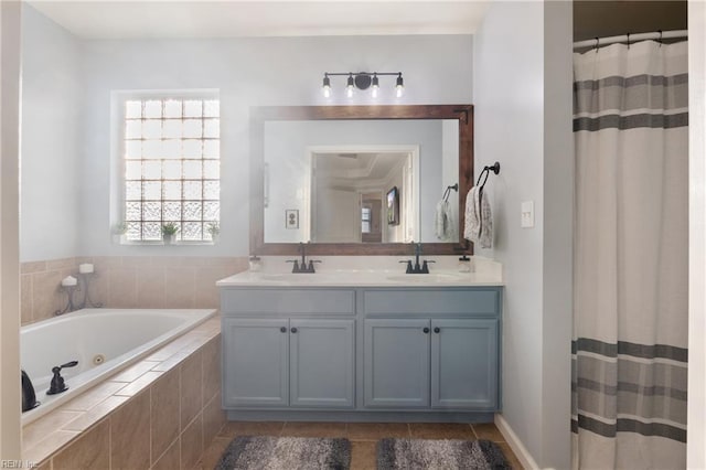 bathroom with plus walk in shower, tile patterned flooring, and vanity