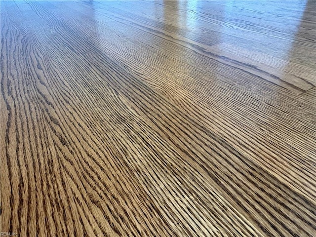 details with wood-type flooring