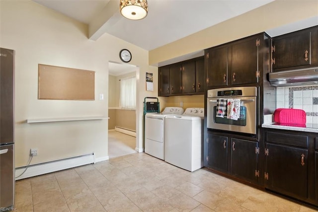 washroom featuring a baseboard heating unit and independent washer and dryer