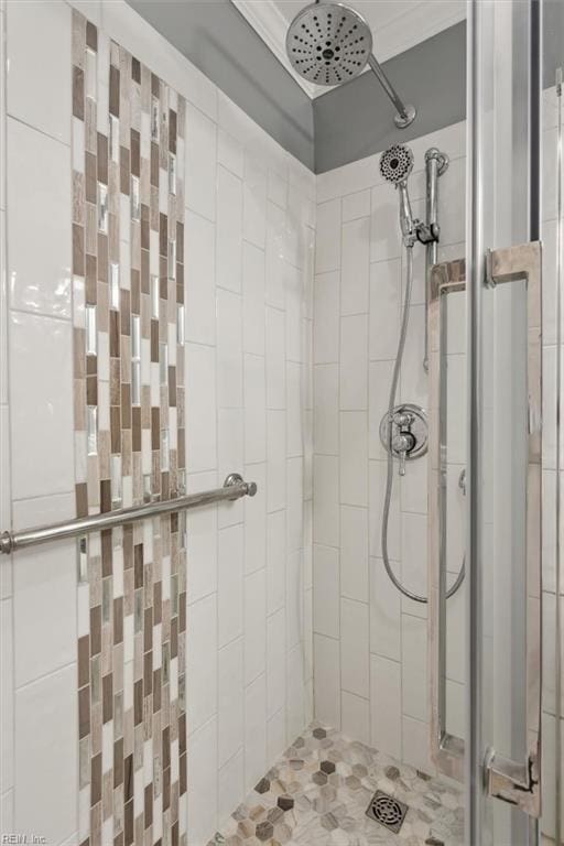 bathroom with tiled shower