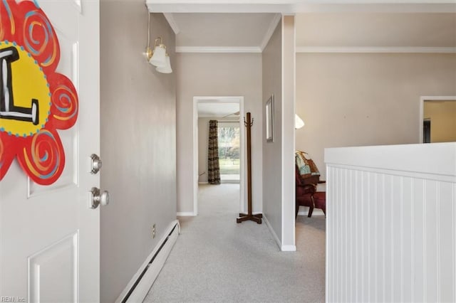 interior space featuring crown molding, light colored carpet, and baseboard heating