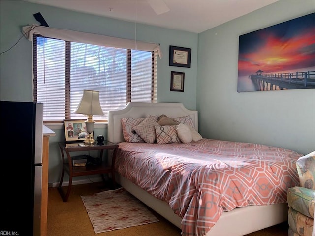 bedroom with carpet flooring and ceiling fan