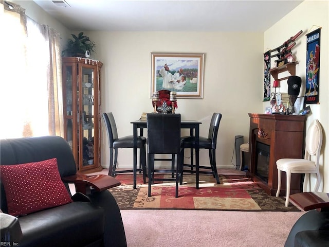 view of carpeted dining space