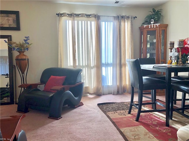 dining room with carpet flooring