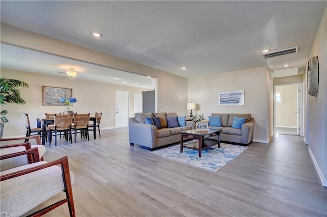 living room featuring light hardwood / wood-style flooring