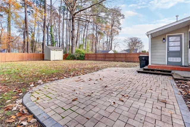 view of patio / terrace with a storage shed