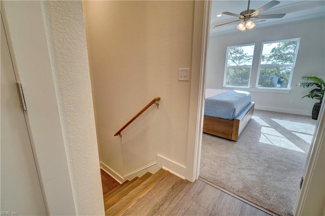 bedroom featuring ceiling fan and light hardwood / wood-style floors