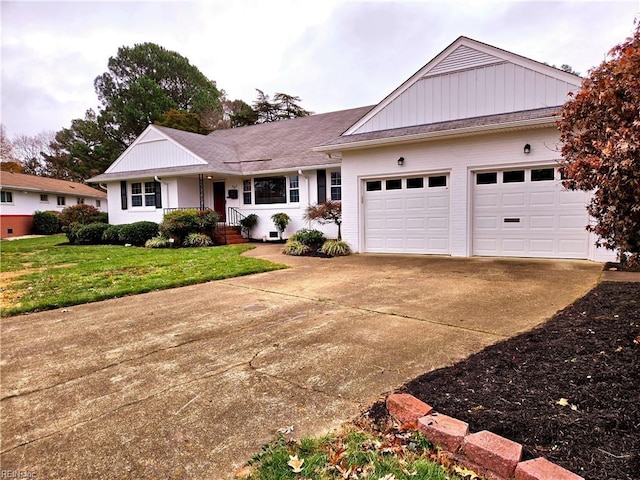 single story home featuring a front yard and a garage