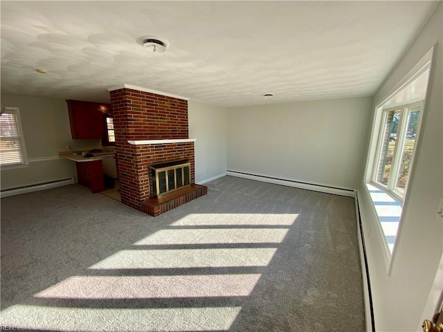 living room featuring carpet flooring, a brick fireplace, and baseboard heating