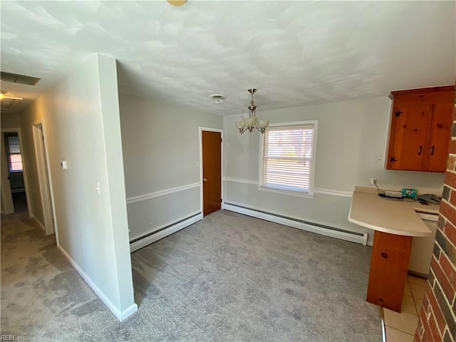 unfurnished dining area featuring a notable chandelier, light colored carpet, and a baseboard radiator