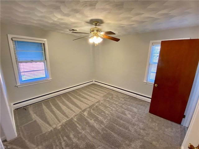 unfurnished room with ceiling fan and carpet floors